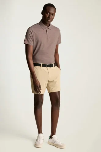 El polo de golf Performance: liso y a rayas