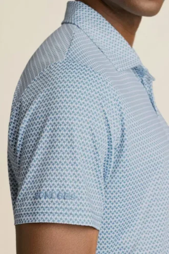 El polo de golf Performance: liso y a rayas