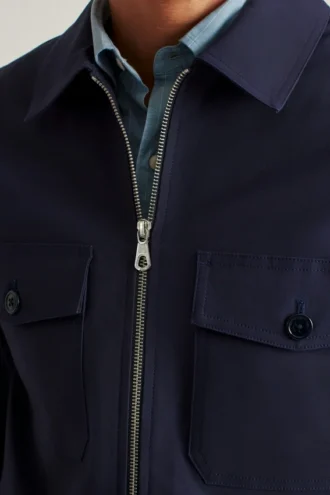 La chaqueta utilitaria de algodón elástico