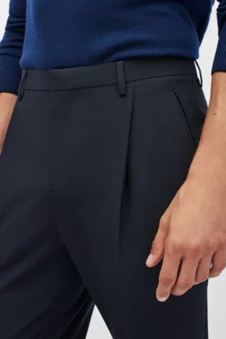 Pantalones de lana elástica con pliegues